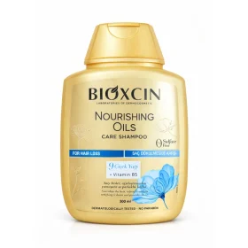 شامپو تقویت کننده و ترمیم کننده مو بیوکسین مدل Nourishing Oils Care مناسب برای انواع مو حجم